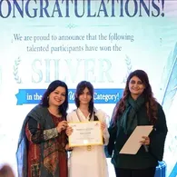 A Spring Buds student receives a Silver award at Create for Peace 2026