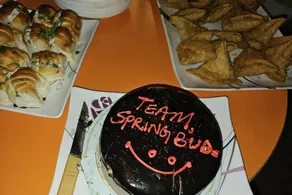 A cake iced "Team Spring Bud" at the staff meeting marking the start of the new session